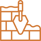 Trowel and bricks construction icon.